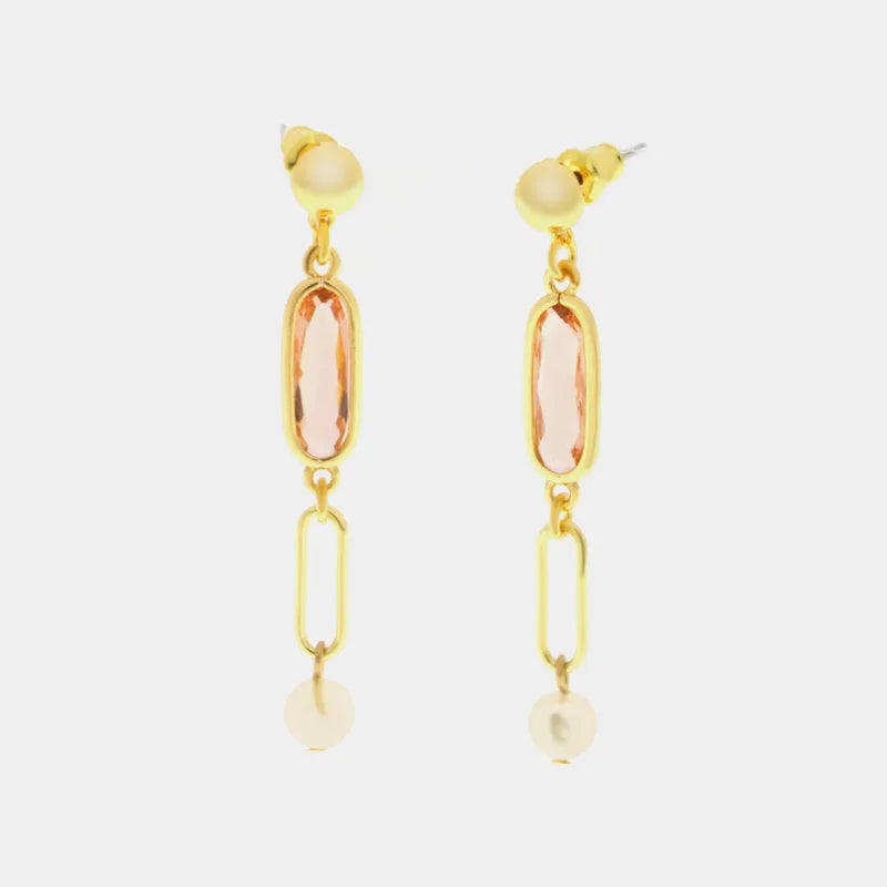 Metal earrings with pink crystals and white pearl