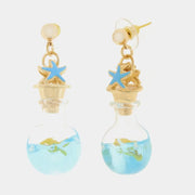 Collana in Metallo con bottiglina con stella  marina e pesciolino