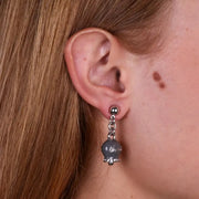 Orecchini in Metallo con campanella grigia scritta capri