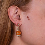 Orecchini in Metallo con campanella arancio scritta capri