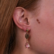 Orecchini in Metallo con foglia e cristallo