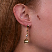 Orecchini in Metallo con cristallini e perla oro pendente