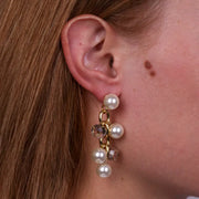 Orecchini in Metallo con catena e perla e cristalli