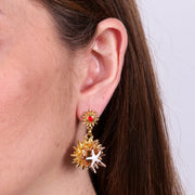 Orecchini in Metallo con cuore  e riccio di mare placcato oro con stella marina bianca