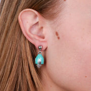 Orecchini in Metallo con pumo verde