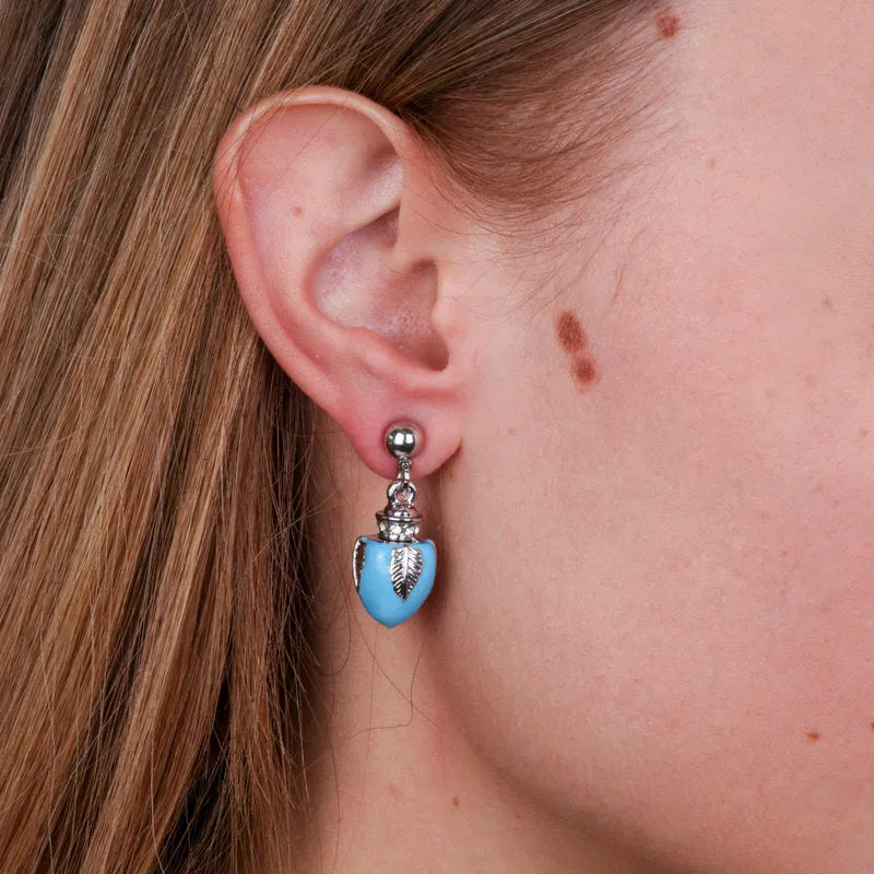 Orecchini in Metallo con pumo azzurro BYS - gioiello BySimon