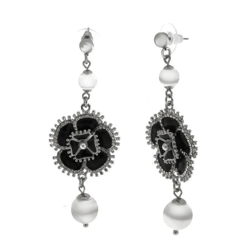 Metal earrings with dangling black flower