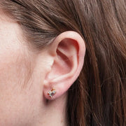 Metal stud earrings with colored zircons
