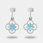 Orecchini in Metallo fiore zirconato azzuro - BYSIMON gioielli