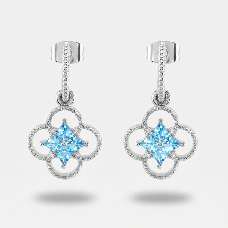 Orecchini in Metallo fiore zirconato azzuro - BYSIMON gioielli