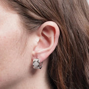 Orecchini in Metallo fiore zirconato blu