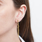 Orecchini in Metallo lunghi con sfere pendenti