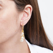 Orecchini in Metallo semicerchio con perle