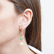 Orecchini in Metallo con cerchi intrecciati e cristallo verde