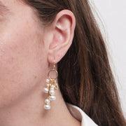 Orecchini in Metallo cerchio con perle pendenti