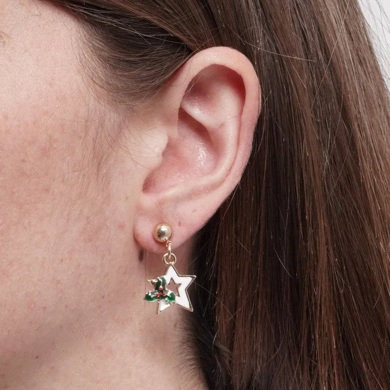 Metal earrings with white star and holly