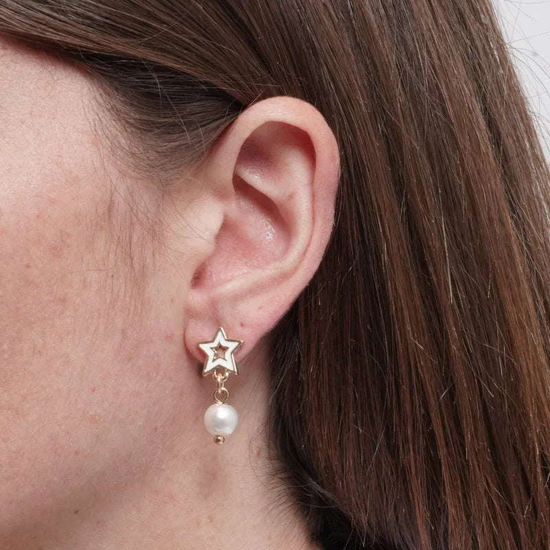 Metal earrings with white star and pearl