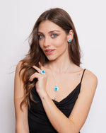 Set coordinato - Orecchini in Metallo con zirconi azzurri centrali