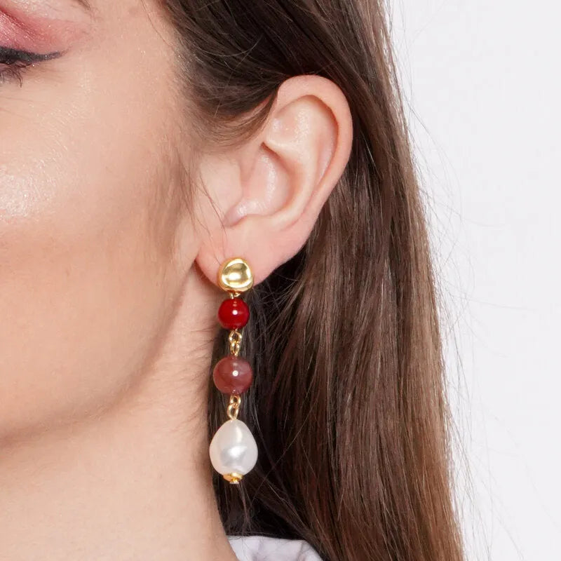 Metal earrings with spheres and stones
