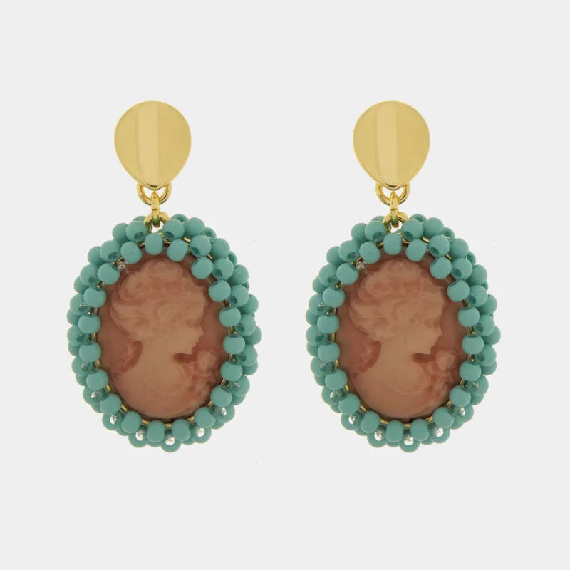 Cameo metal earrings with turquoise spheres