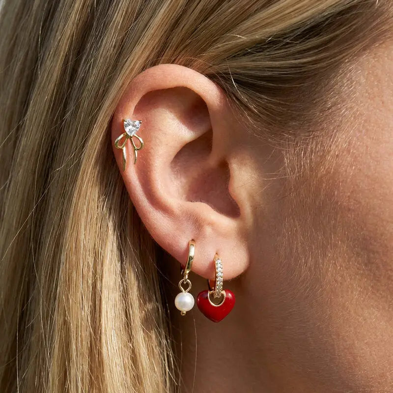 Orecchini in Metallo Set da sei dorato con cuore rosso e fiocco