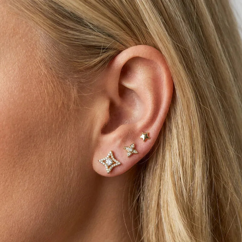 Orecchini in Metallo set da sei dorato stelle