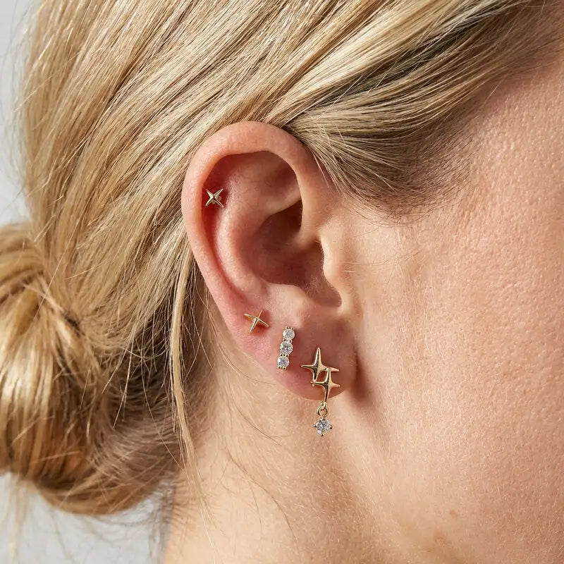 Orecchini in Metallo set da sei dorato con stelle e cristalli