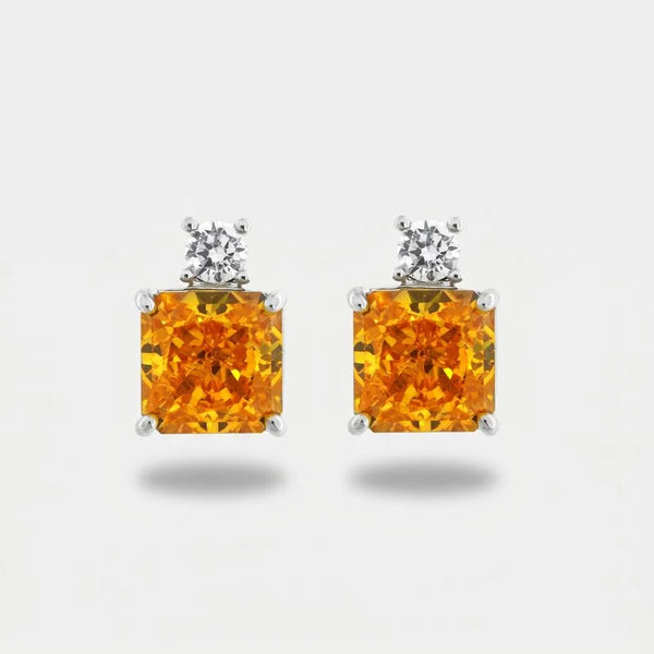 Orecchini in Metallo con zircone centrale giallo