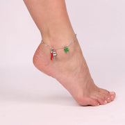 Cavigliera  in Metallo multi ciondoli portafortuna, campana, quadrifoglio e cornetto, impreziositi da smalti colorati