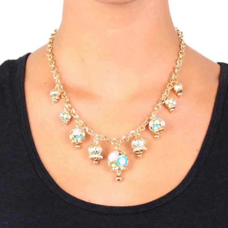 Collana in Metallo con campane pendenti colorati e cristalli bianchi - BYSIMON gioielli