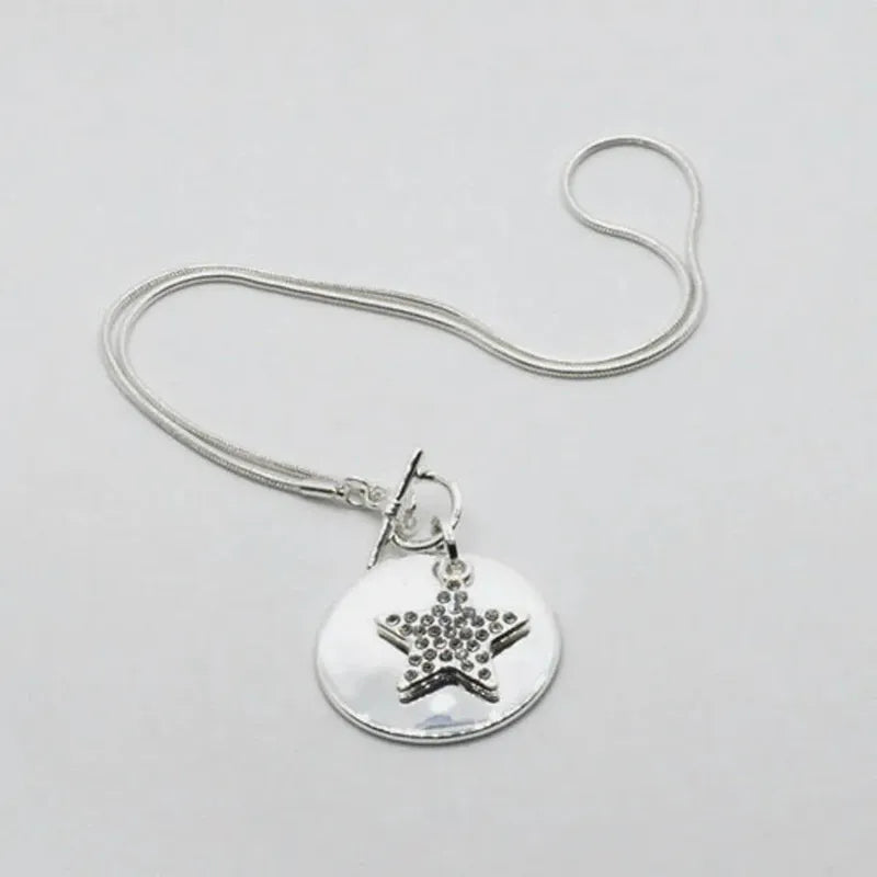 Collana in Metallo stella e medaglietta pendenti con cristalli