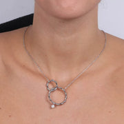Collana in Metallo con doppio cerchio pendente impreziosito da cristalli bianchi