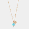 Collana in Metallo con campanella portafortuna pendente, impreziosita da smalto turchese e cristalli