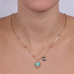 Collana in Metallo con campanella portafortuna pendente, impreziosita da smalto verde e cristalli - BYSIMON gioielli