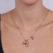 Collana in Metallo con corno pendente impreziosito da punte di smalto turchese e campanella in smalti multicolore