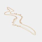 Collana in Metallo a catena lunga multifili, impreziosita da sfere effetto perle pendenti