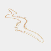 Collana in Metallo a catena lunga multifili, impreziosita da sfere effetto perle pendenti