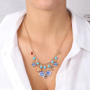 Collana in Metallo in stile marino, con sole scritta Capri, campanella e luna