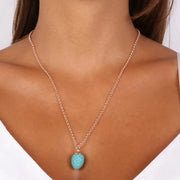 Collana in Metallo con pendente a forma di pigna portafortuna smaltata turchese