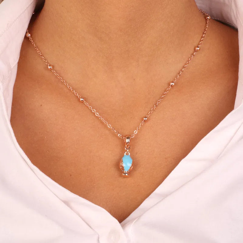 Collana in Metallo con pumo portafortuna color turchese - BYSIMON gioielli