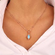 Collana in Metallo con pumo portafortuna color turchese