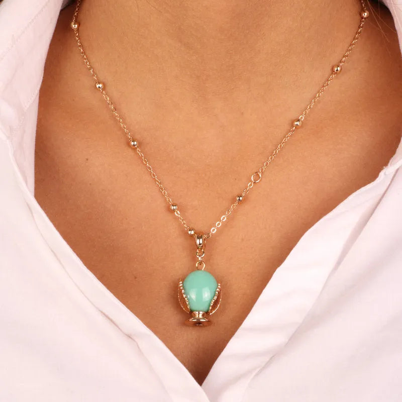 Collana in Metallo con pumo portafortuna smaltato color verde acqua - BYSIMON gioielli