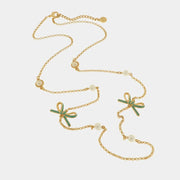 Collana in Metallo con perle e fiocco centrale