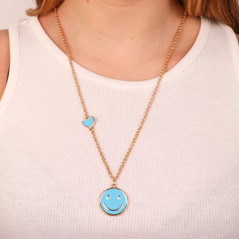 Collana in Metallo con pendente a forma di smile e cuore azzurro - BYSIMON gioielli