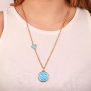 Collana in Metallo con pendente a forma di smile e cuore azzurro