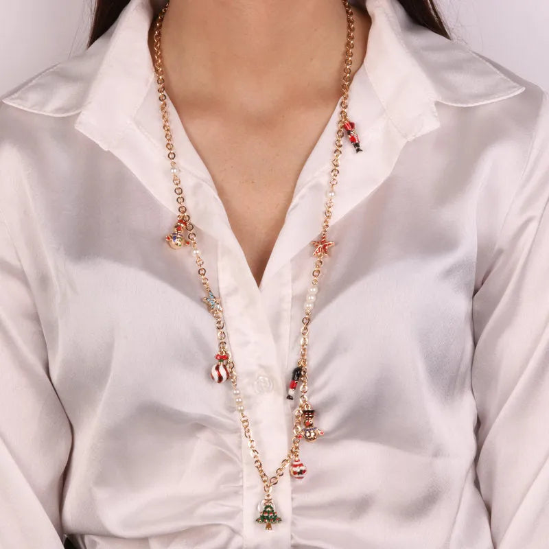 Metal necklace with pendants in the shape of a Christmas tree, balls, stars and nutcrackers