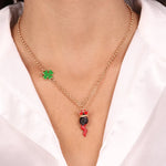 Collana in Metallo con corno pendente impreziosito da corona e quadrifoglio - BYSIMON gioielli