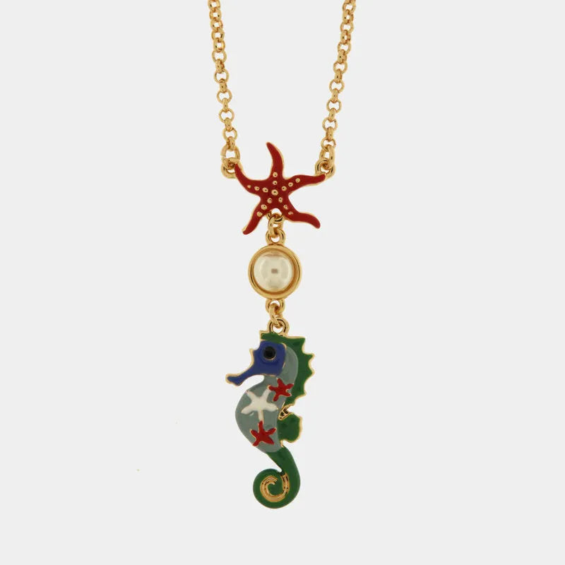 Metal necklace with seahorse and small pearl