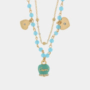 Collana in Metallo con campana smaltata turchese e cuoricini pendenti