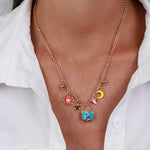 Collana in Metallo con campanella a forma di orsetto blu e piccola margherita, luna e cuore